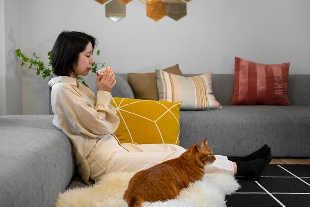 Side view japanese woman with cat