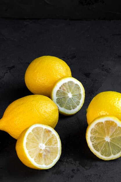 Side view lemons with lemon slices