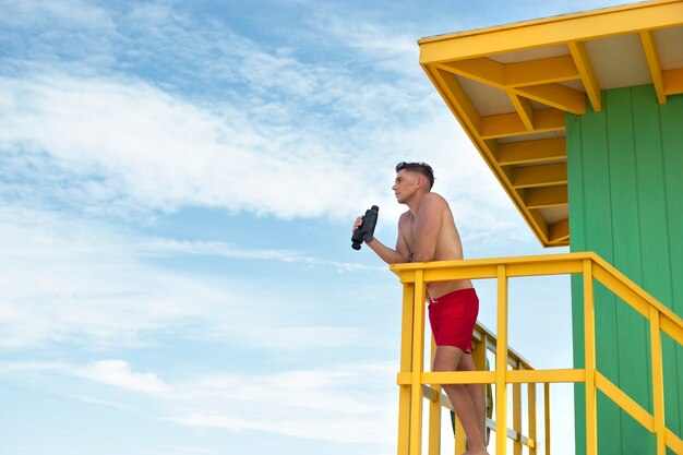 Side view lifeguard outdoors