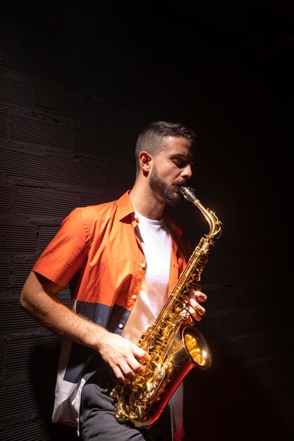 Side view of male musician