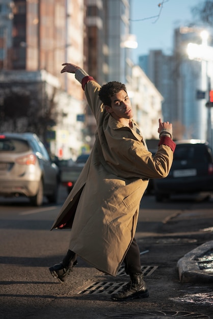 Free photo side view male performing ballet