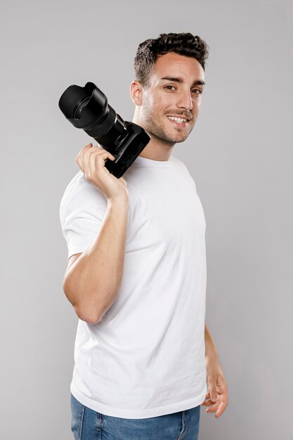 Side view of male photographer