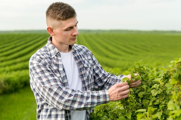 Side view man at farm