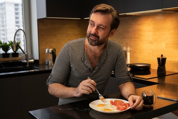 Side view man having breakfast