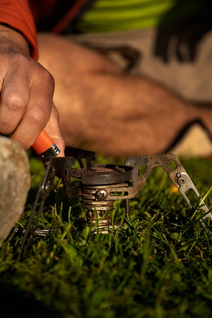 Side view man holding lighter