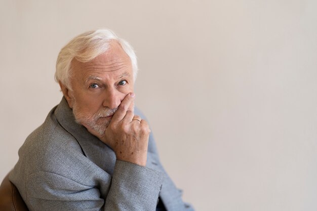 Side view man posing indoors