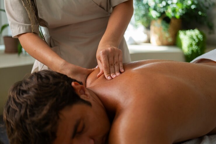 Free Photo side view man relaxing at spa