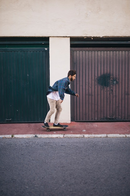 Side view of man skateboarding