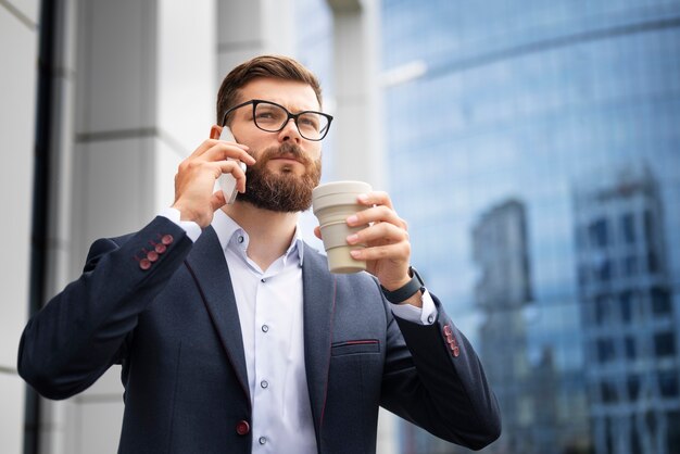 Side view man talking on phone