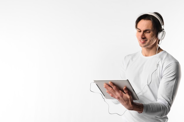 Side view man using tablet