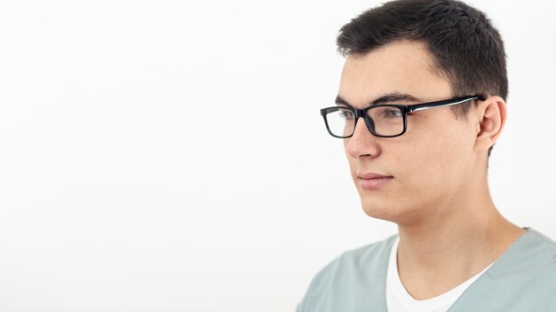 Side view of man wearing glasses with copy space