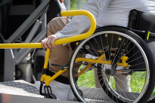 Side view man in wheelchair