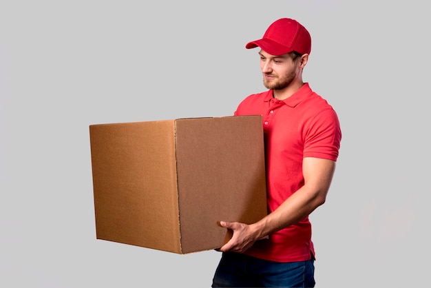 Side view man with package box