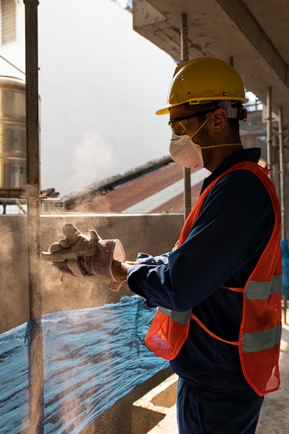 Side view man with safety equipment