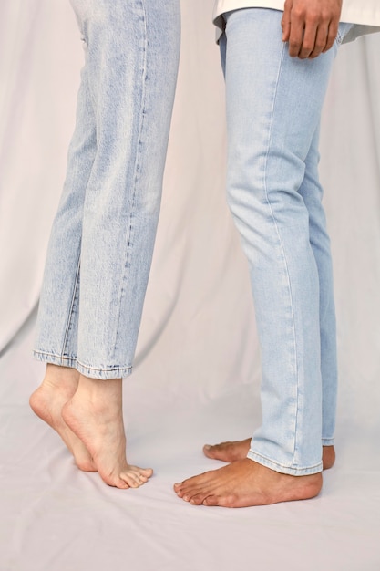 Side view of man and woman legs