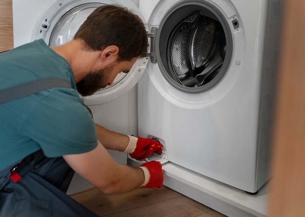 Side view man working as plumber