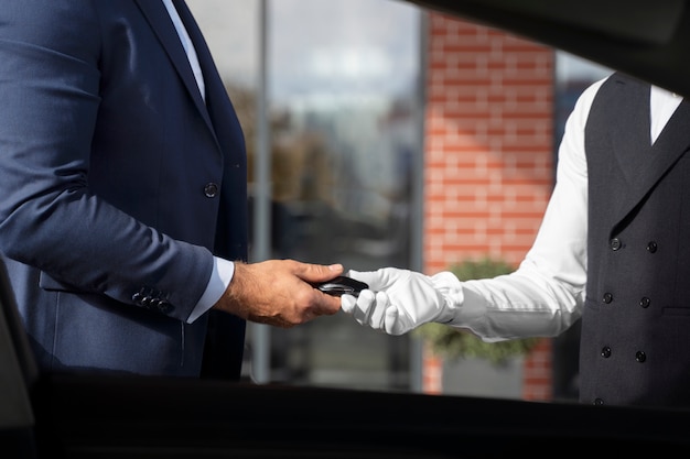 Side view men holding car key