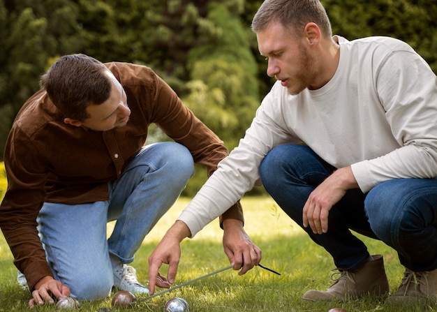 Side view men measuring distance