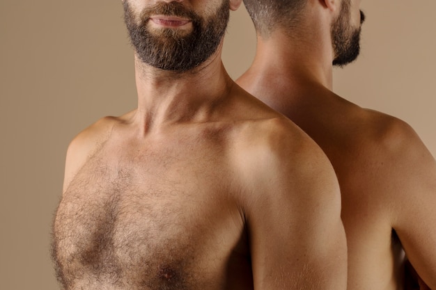 Side view men posing together