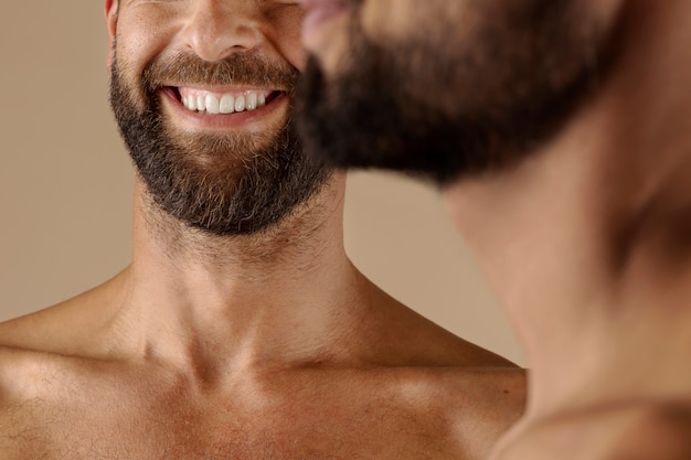 Side view men with beards posing