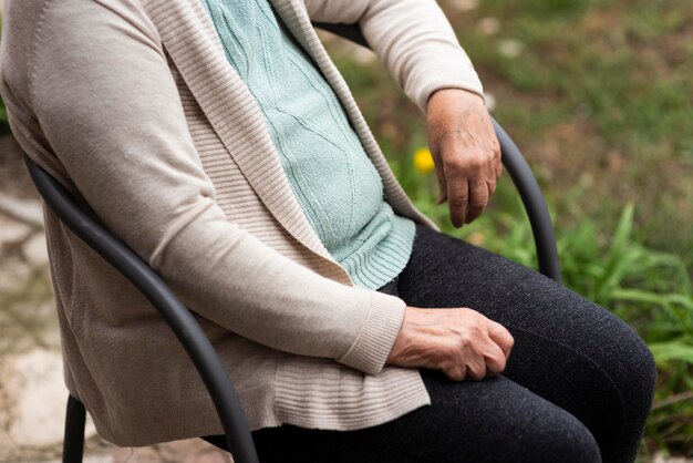 Side view of old woman in a nursing home