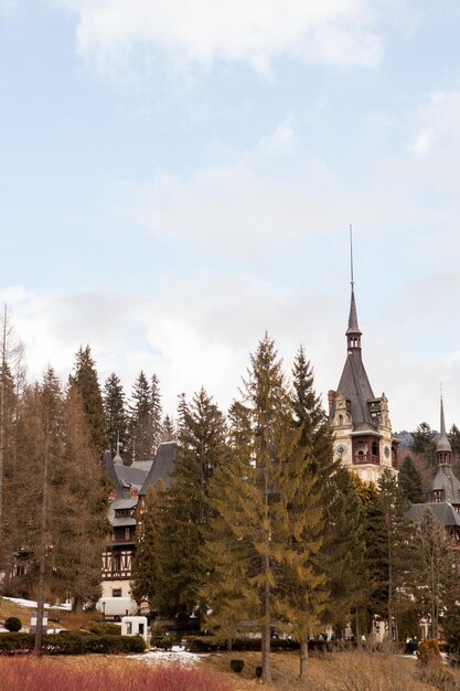 Side view of Peles Castle from Sinaia, Romania. Medieval castle