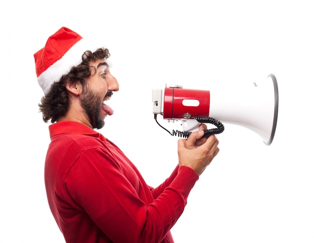Side view of playful man with a megaphone