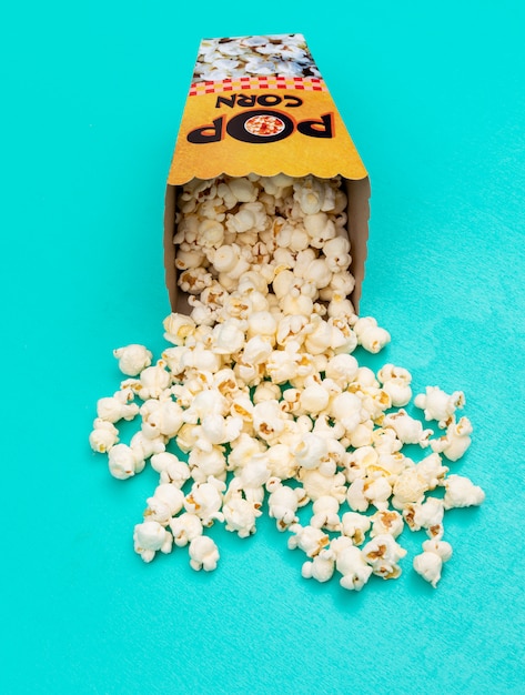 Free photo side view of popcorn  vertical