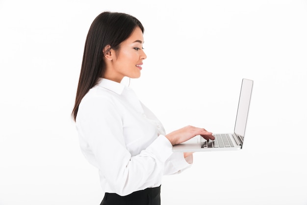 Side view portrait of a smiling asian businesswoman