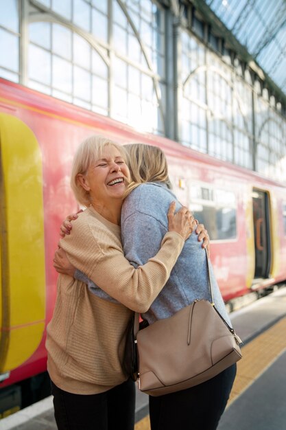 Side view queer women hugging