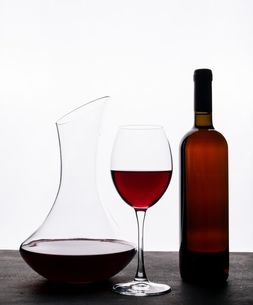 Side view red wine with glass on white vertical