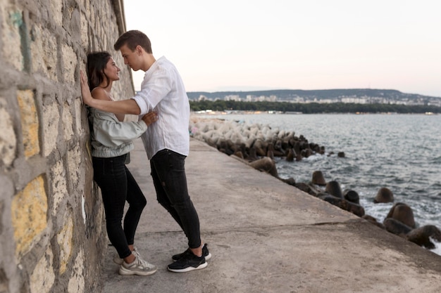 Side view of romantic couple being intimate outdoors