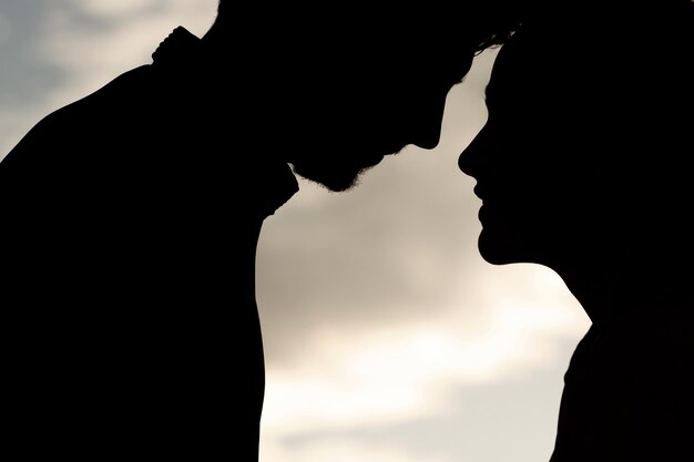 Side view romantic couple silhouettes
