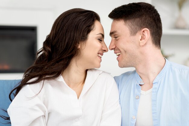 Side view of romantic smiley couple