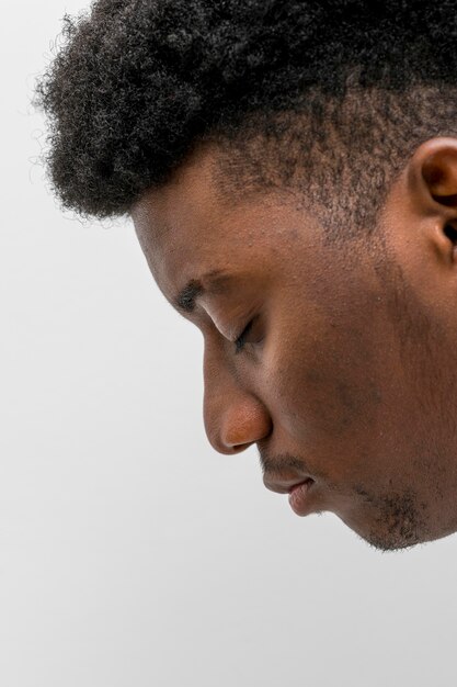 Side view of sad black man with copy space