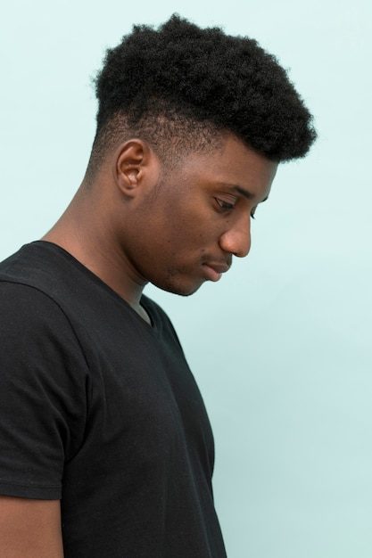 Side view of sad black man