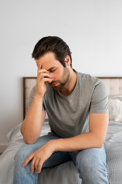 Side view sad man dealing with std