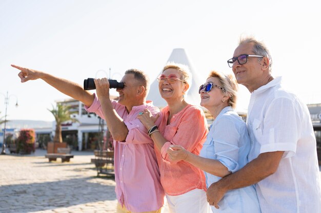 Side view senior couples looking away