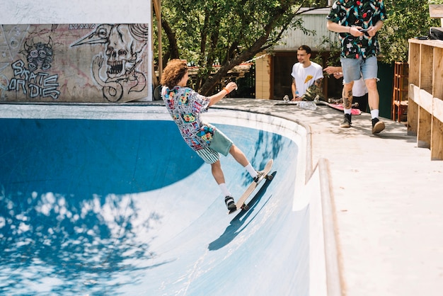 Side view of skateboarding man