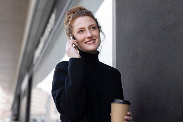 Side view smiley business woman