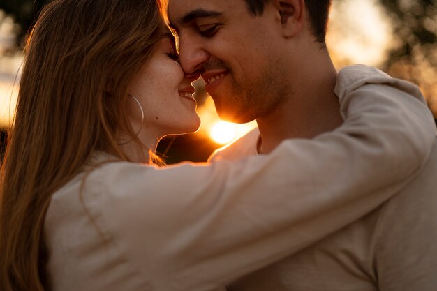 Side view smiley couple being in love