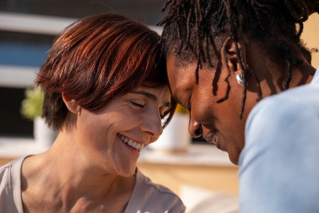 Side view smiley lesbian couple