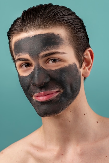 Side view smiley man with face mask