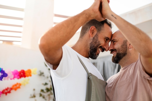 Free photo side view smiley men celebrating