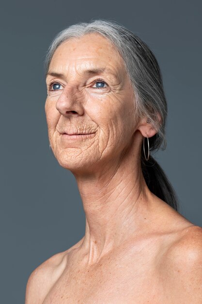 Side view smiley senior woman skin texture