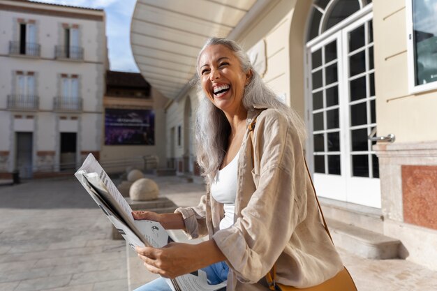 Side view smiley woman outdoors