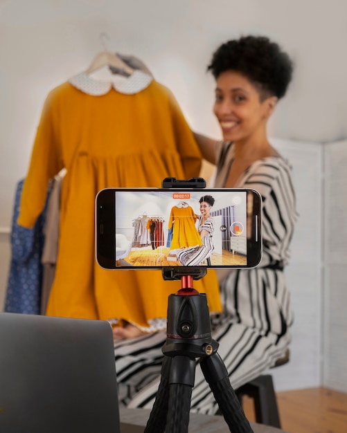 Side view smiley woman with clothes