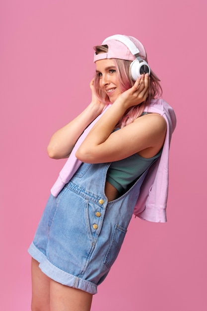 Side view smiley woman with headphones