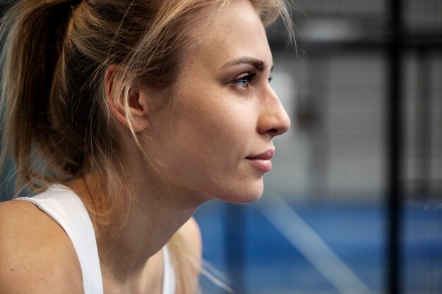 Side view sporty woman playing game