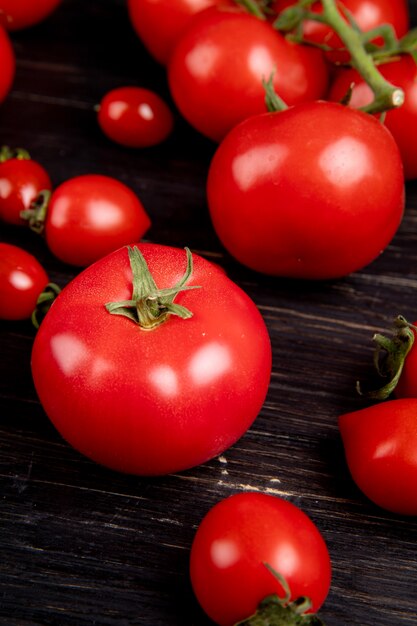 Side view of tomatoes on wooden table 13